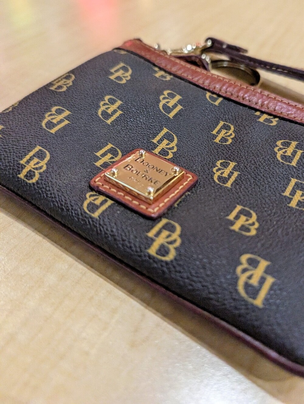 Dooney & Bourke Brown Logo Wristlet